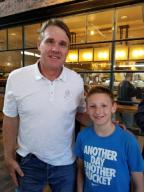 Kyle with Coach Gruden